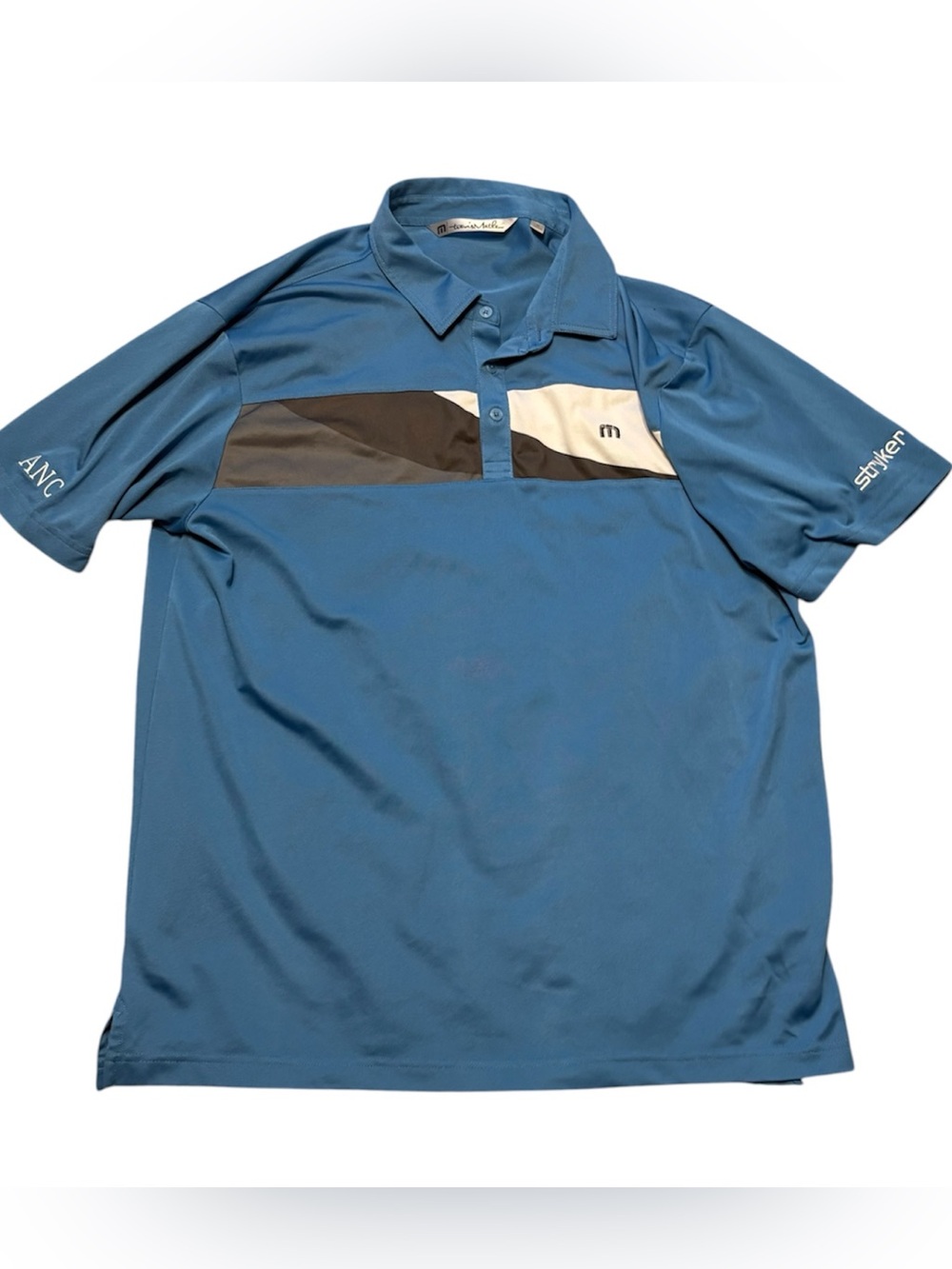 Travis Mathew Men's Blue Polo with Black and Cream Chest Panels